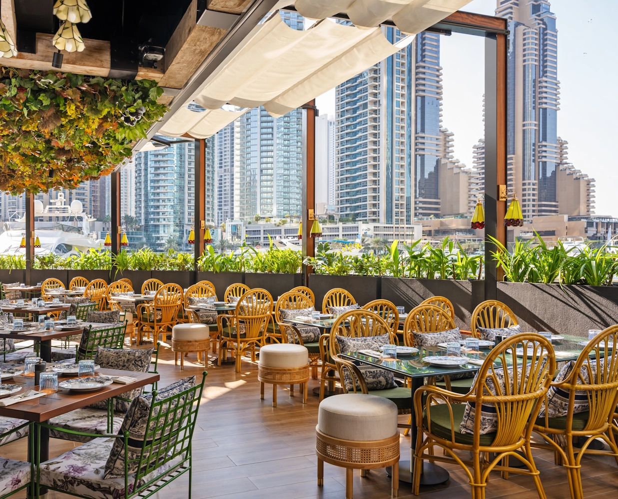 Best restaurants for group dining in Dubai Marina Outdoor dining terrace at Blume Restaurant Dubai Marina