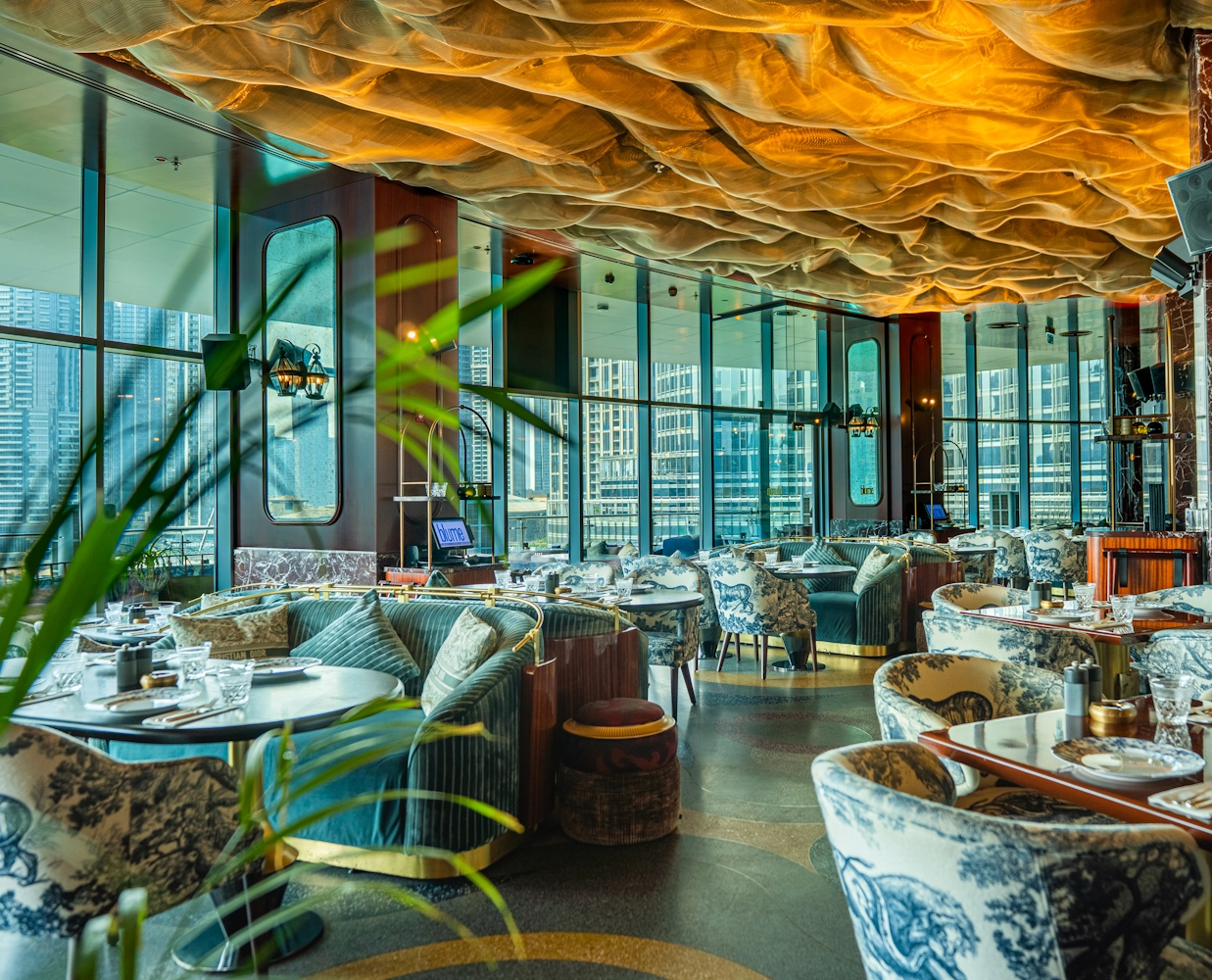 Blume Dubai Mall Venue Indoor dining area with marina view at Blume Restaurant Dubai
