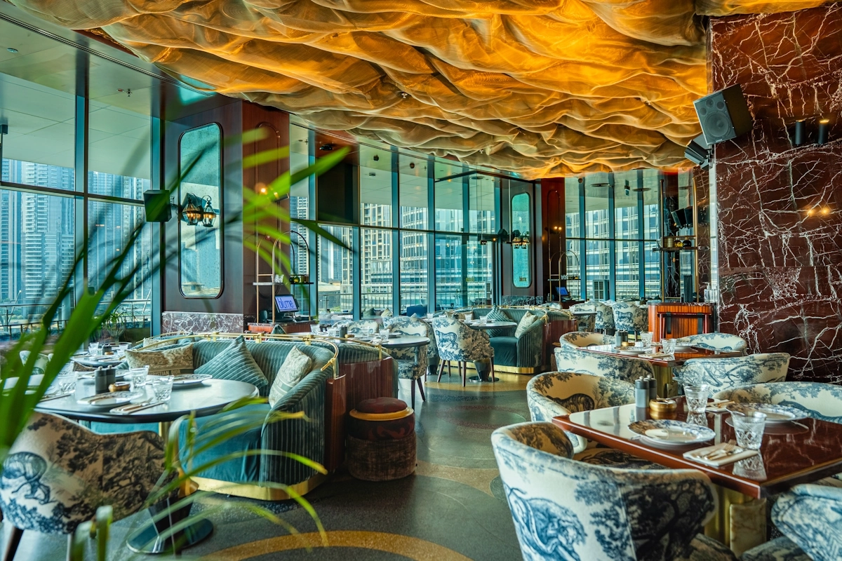 Blume Dubai Mall ambience Indoor dining area with city view at Blume Restaurant Dubai