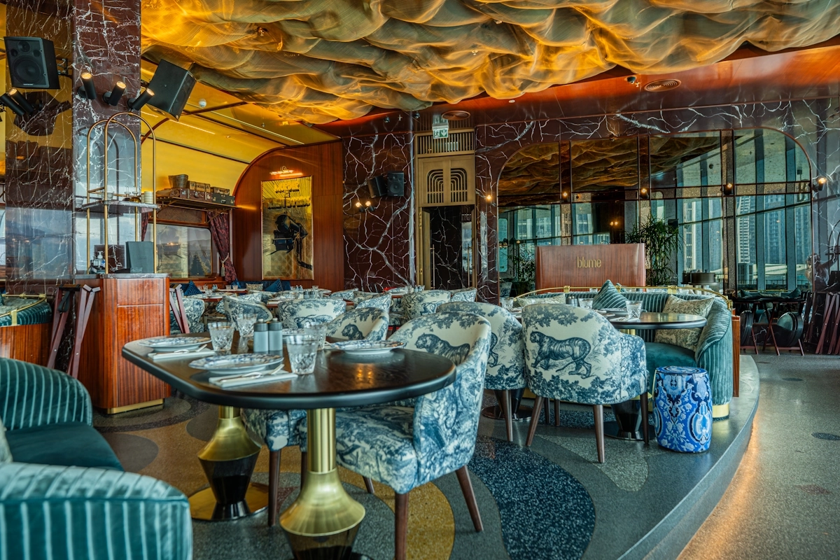 Blume Dubai Mall inside Luxury dining room with artistic ceiling at Blume Restaurant Dubai