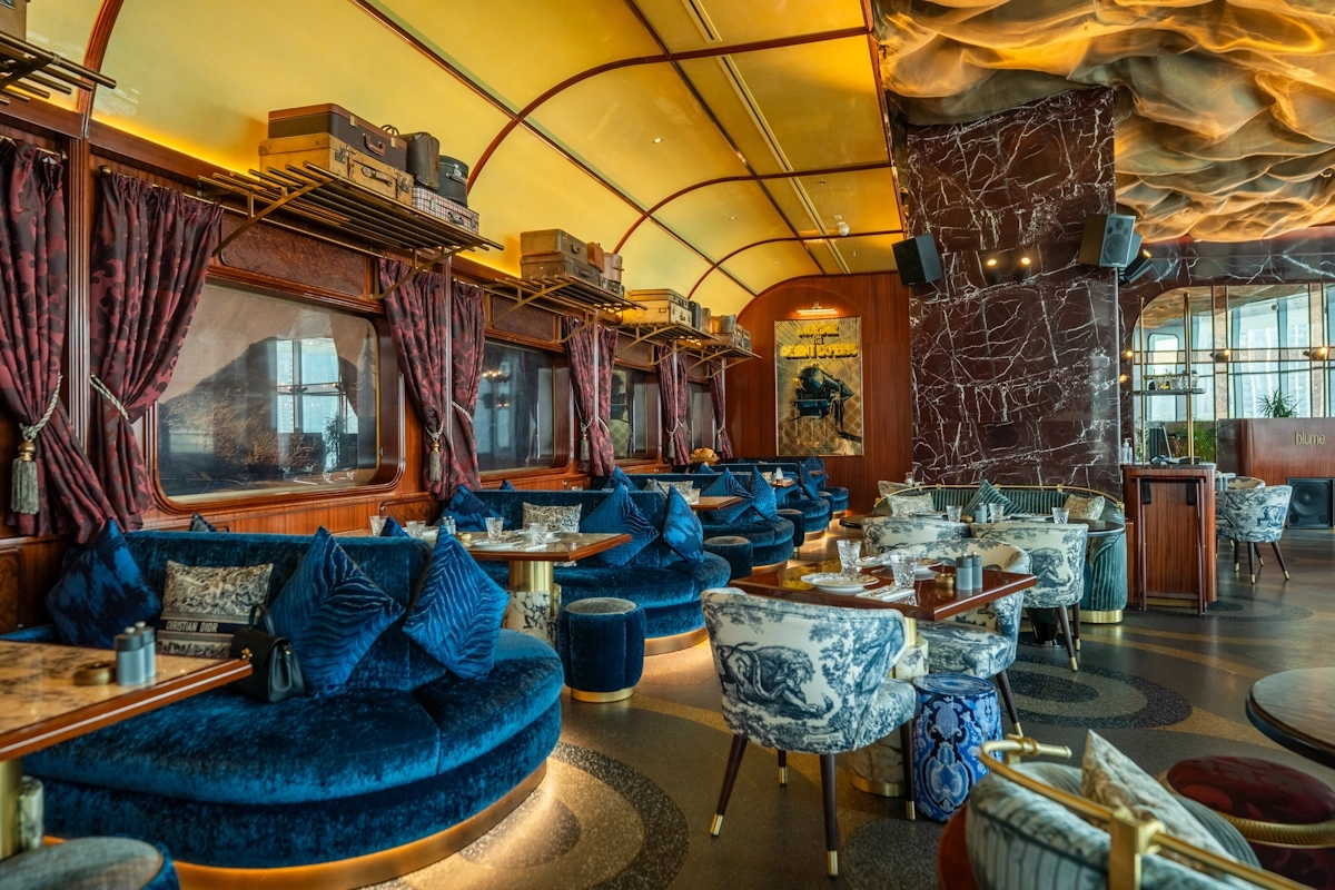 Blume Dubai Mall tables Luxury blue seating area at Blume Restaurant Dubai