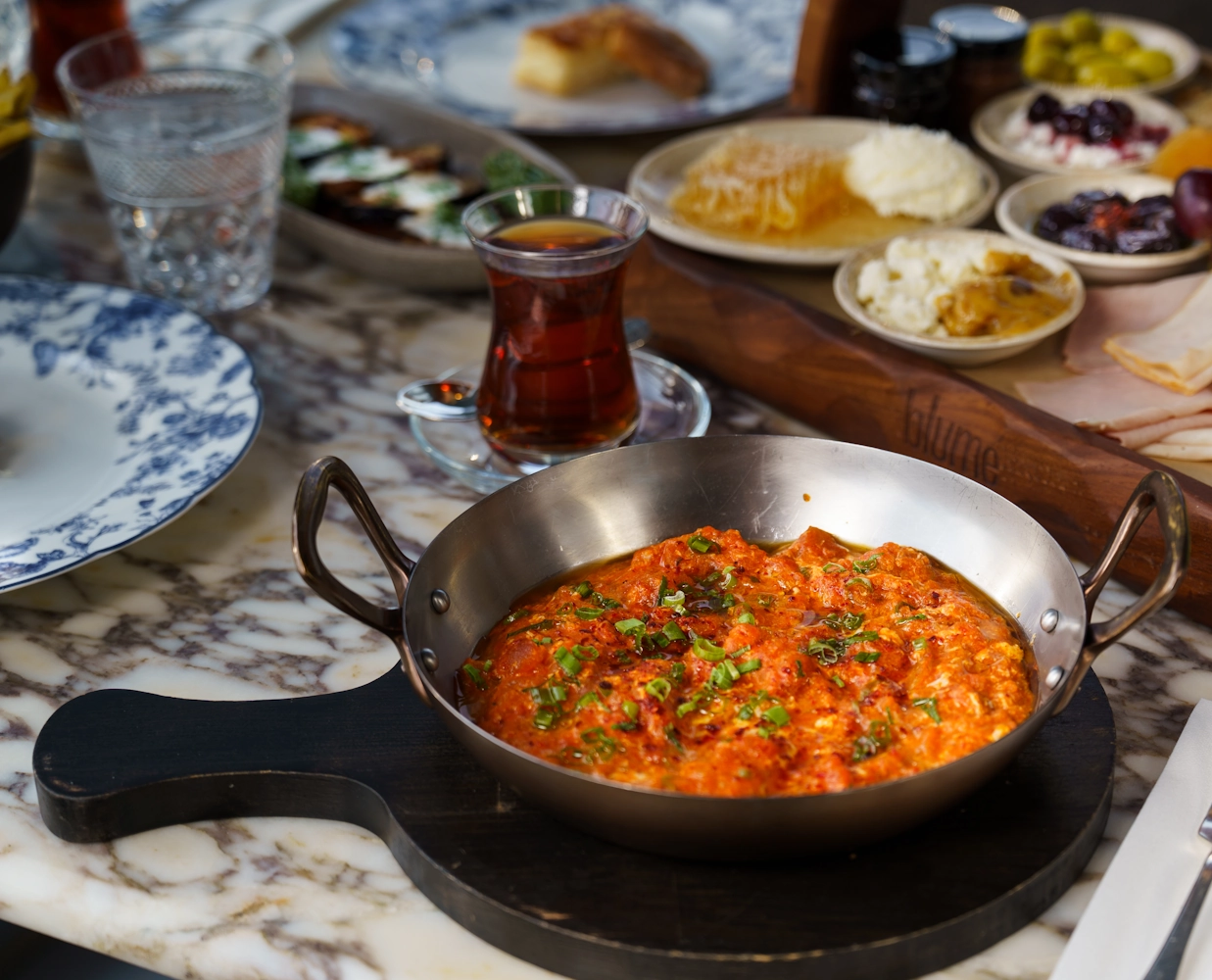 Turkish breakfast Turkish menemen and tea at Blume Restaurant Dubai